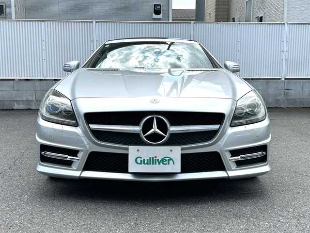 メルセデス・ベンツ ＳＬＫ２００ 栃木県 2013(平25)年 4.2万km イリジウムシルバー 純正メーカーナビ（フルセグTV/Bluetooth/CD/DVD）/AMGスポーツパッケージ/電動オープン/コーナーセンサー/ETC/純正フロアマット/純正18インチアルミホイール/ステアリングリモコン/革巻きステアリング/パドルシフト/オートライト/横滑り防止装置/シートヒーター/前席メモリーシート/ドライブレコーダー/スペアキー１