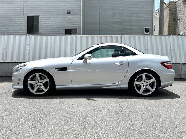 メルセデス・ベンツ ＳＬＫ２００ 栃木県 2013(平25)年 4.2万km イリジウムシルバー 純正メーカーナビ（フルセグTV/Bluetooth/CD/DVD）/AMGスポーツパッケージ/電動オープン/コーナーセンサー/ETC/純正フロアマット/純正18インチアルミホイール/ステアリングリモコン/革巻きステアリング/パドルシフト/オートライト/横滑り防止装置/シートヒーター/前席メモリーシート/ドライブレコーダー/スペアキー１
