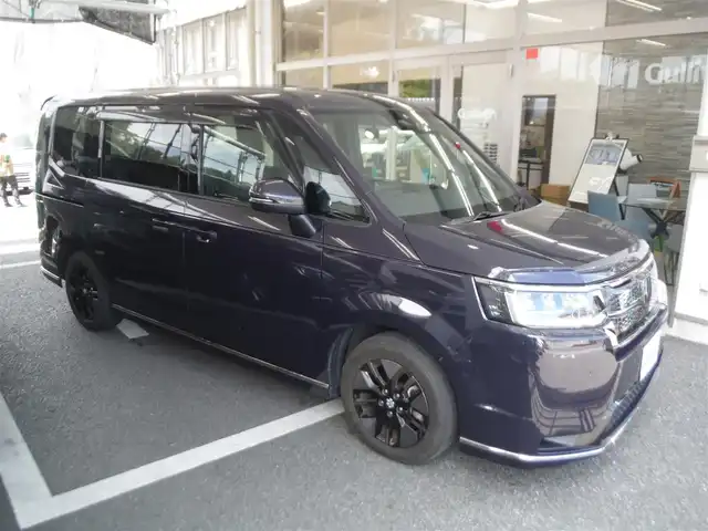 ホンダ ステップワゴン スパーダ 東京都 2022(令4)年 2万km トワイライトミストブラックパール ワンオーナー車/保証書・取説あり/純正11.4インチナビ・TV・DVD/　BLUETOOTH・HDMI・USB/　マルチビューカメラ・2.0ETC/　ドライブレコーダー前後/ホンダセンシング/　クルーズコントロール/　ブラインドスポット/　ミラーヒーター/　パーキングセンサー/フローリングシート/両側パワースライドドア/パワーバックドア/セカンドシートオットマン/スマートキー×2個