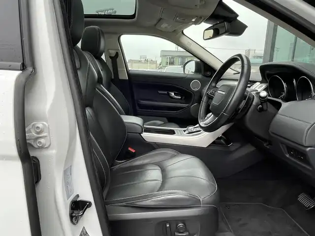 ランドローバー レンジローバーイヴォーク HSE 石川県 2016(平28)年 4.8万km 白 4WD/パノラマガラスルーフ/黒革シート/純正DVDナビ/バック/サイド/フロント/全周囲カメラ/MERIDIANプレミアムサウンド/フルセグＴＶ/Bluetooth/USB/AUX/iPod/クルーズコントロール/ブラインドスポットモニター/アダプティブダイナミクス/クリアランスソナー/電動格納ミラー/オートライト/HIDヘッドライト/フォグランプ(前後)/パワーシート(前席)/メモリーシート(前席)/シートヒーター(前席)/電動リアゲート/ETC/パドルシフト/トノカバー/スペアタイヤ積載(1本)