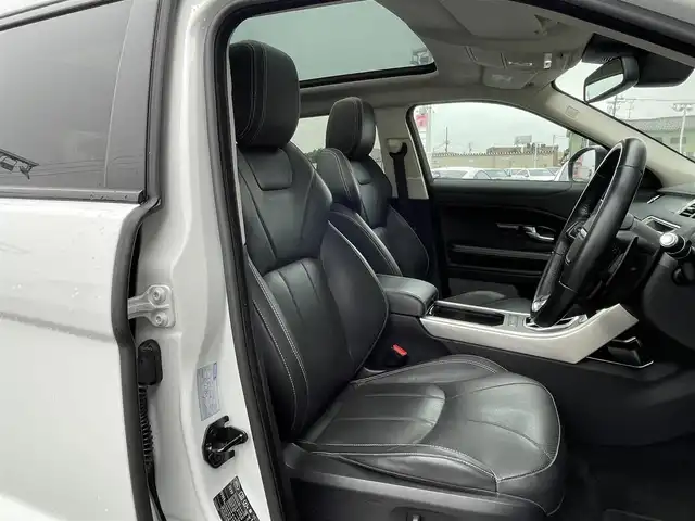 ランドローバー レンジローバーイヴォーク HSE 石川県 2016(平28)年 4.8万km 白 4WD/パノラマガラスルーフ/黒革シート/純正DVDナビ/バック/サイド/フロント/全周囲カメラ/MERIDIANプレミアムサウンド/フルセグＴＶ/Bluetooth/USB/AUX/iPod/クルーズコントロール/ブラインドスポットモニター/アダプティブダイナミクス/クリアランスソナー/電動格納ミラー/オートライト/HIDヘッドライト/フォグランプ(前後)/パワーシート(前席)/メモリーシート(前席)/シートヒーター(前席)/電動リアゲート/ETC/パドルシフト/トノカバー/スペアタイヤ積載(1本)