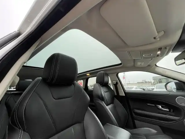 ランドローバー レンジローバーイヴォーク HSE 石川県 2016(平28)年 4.8万km 白 4WD/パノラマガラスルーフ/黒革シート/純正DVDナビ/バック/サイド/フロント/全周囲カメラ/MERIDIANプレミアムサウンド/フルセグＴＶ/Bluetooth/USB/AUX/iPod/クルーズコントロール/ブラインドスポットモニター/アダプティブダイナミクス/クリアランスソナー/電動格納ミラー/オートライト/HIDヘッドライト/フォグランプ(前後)/パワーシート(前席)/メモリーシート(前席)/シートヒーター(前席)/電動リアゲート/ETC/パドルシフト/トノカバー/スペアタイヤ積載(1本)