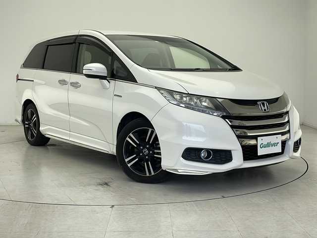 ホンダ オデッセイ ハイブリッド アブソルート ホンダセンシング 千葉県 2016(平28)年 4.2万km ホワイトオーキッドパール 衝突軽減ブレーキ/クルーズコントロール/純正SDナビ/（フルセグ/Bluetooth/FM/AM）/バックカメラ/ETC/アイドリングストップ/ハーフレザーシート/パワーシート/レーンキープアシスト/LEDヘッドライト/電動格納ミラー