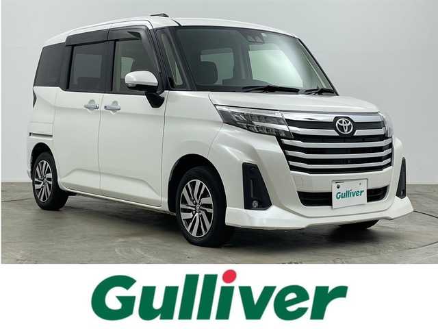 トヨタ ルーミー カスタムG 岡山県 2022(令4)年 2.9万km パールホワイトⅢ 社外10インチポータブルナビ（G10-AU06)/【Bluetooth/TV】/LEDヘッドライト/LEDフォグランプ/前席シートヒーター/オートライト/両側電動スライドドア/衝突軽減ブレーキ/コーナーセンサー（前後）/アイドリングストップ/純正14インチアルミホイール/オートブレーキホールド/ISOFIX/チルトステアリング/D席シートリフター/シートバックテーブル/スペアタイヤ/ウインカーミラー/ドアバイザー