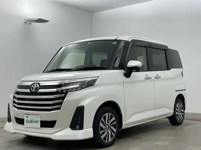 トヨタ ルーミー カスタムG 岡山県 2022(令4)年 2.9万km パールホワイトⅢ 社外10インチポータブルナビ（G10-AU06)/【Bluetooth/TV】/LEDヘッドライト/LEDフォグランプ/前席シートヒーター/オートライト/両側電動スライドドア/衝突軽減ブレーキ/コーナーセンサー（前後）/アイドリングストップ/純正14インチアルミホイール/オートブレーキホールド/ISOFIX/チルトステアリング/D席シートリフター/シートバックテーブル/スペアタイヤ/ウインカーミラー/ドアバイザー