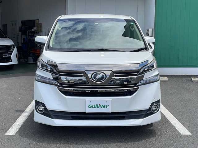 トヨタ ヴェルファイア V 京都府 2015(平27)年 6.6万km ホワイトパールクリスタルシャイン 純正９インチナビ　ＤＶＤ再生　Ｂｌｕｅｔｏｏｔｈオーディオ　フルセグ　バックカメラ　後席フリップダウンモニター　プリクラッシュセーフティ　レーダークルーズコントロール　両側パワースライド　ＬＥＤライト