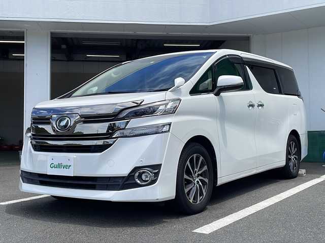 トヨタ ヴェルファイア V 京都府 2015(平27)年 6.6万km ホワイトパールクリスタルシャイン 純正９インチナビ　ＤＶＤ再生　Ｂｌｕｅｔｏｏｔｈオーディオ　フルセグ　バックカメラ　後席フリップダウンモニター　プリクラッシュセーフティ　レーダークルーズコントロール　両側パワースライド　ＬＥＤライト