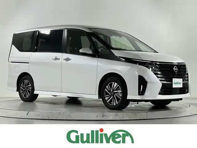 日産 セレナ ハイウェイスター V 佐賀県 2023(令5)年 3.4万km パール AA仕入：評価点4.5点/社外ナビ＜Bluetooth有＞/アラウンドビューカメラ/インテリジェントルームミラー/プロパイロット/両側パワースライドドア/ハンズフリースライドドア/ドライブレコーダー前方タイプ/パドルシフト/LEDヘッドライト/LEDフォグランプ/オートマチックハイビーム/エマージェンシーブレーキ/レーンキープアシスト＜ハンドル支援機能付き＞/ブラインドスポットモニター/踏み間違い防止