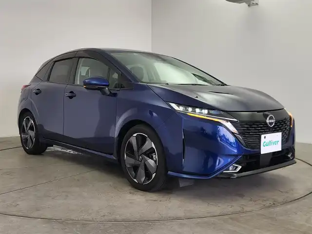 日産 オーラ G 愛知県 2022(令4)年 4.5万km オーロラフレアブルーパール 純正ディスプレイオーディオナビ/（Bluetooth/TV/HDMI/USB入力/AM/FM）/全方位カメラ/BOSEスピーカー/置くだけ充電/プロパイロット/BSM/ETC2.0/ドラレコ/電動格納ミラー/電子パーキング/オートホールド/ハーフレザー/ステアリングリモコン/デジタルインナーミラー/ドアバイザー/プッシュスタート/スマートキー/純正フロアマット