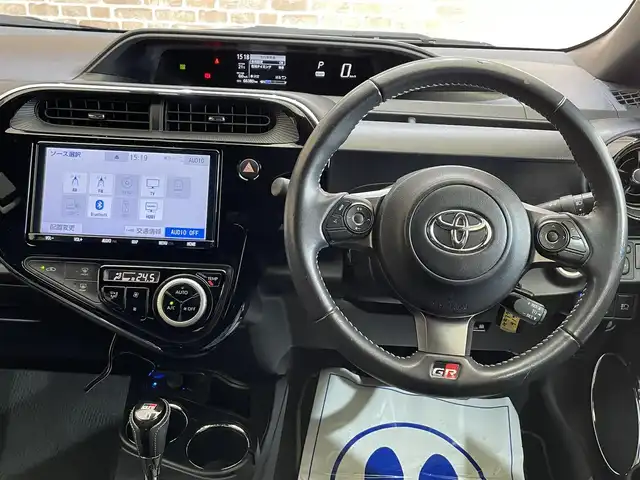トヨタ アクア G GRスポーツ 17インチPKG 岩手県 2019(令1)年 6.7万km ホワイトパールクリスタルシャイン トヨタセーフティセンスC/プリクラッシュセーフティ/レーンディパーチャーアラート/オートマチックハイビーム/先行車発進告知機能/クルーズコントロール/横滑り防止装置/シートヒーター/オートライト/LEDヘッドランプ/専用チューニングサスペンション/補強ブレース/GR３本スポーク小径ステアリング/スポーツシート/専用チューニングパワーステアリング/純正ナビ/バックカメラ/ETC２．０/ドライブレコーダー/専用１７インチアルミホイール