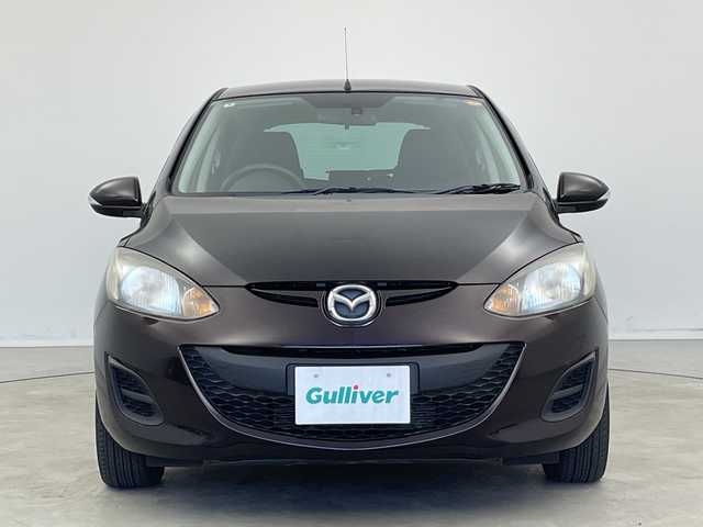 マツダ デミオ 13－スカイアクティブ 新潟県 2012(平24)年 4.6万km ラディアントエボニーマイカ ステアリングスイッチ/ハンドブレーキ/カードホルダー/純正ドアバイザー/リモコンキー/スペアキー/アイドリングストップ/純正メモリナビ/ワンセグ/USB入力端子/フルフラットシート/純正フロアマット/キセノンオートライト/ISOFIX