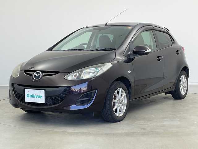 マツダ デミオ 13－スカイアクティブ 新潟県 2012(平24)年 4.6万km ラディアントエボニーマイカ ステアリングスイッチ/ハンドブレーキ/カードホルダー/純正ドアバイザー/リモコンキー/スペアキー/アイドリングストップ/純正メモリナビ/ワンセグ/USB入力端子/フルフラットシート/純正フロアマット/キセノンオートライト/ISOFIX