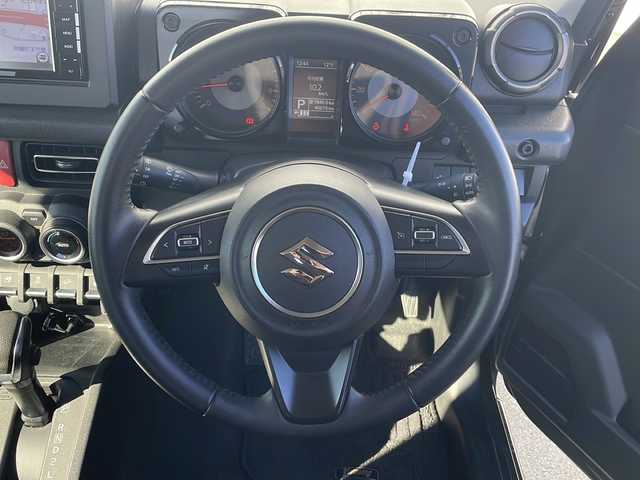 スズキ ジムニー XC 三重県 2018(平30)年 4.7万km ジャングルグリーン 禁煙/社外ナビ/フルセグTV/バックカメラ/シートヒーター/クルーズコントロール/背面タイヤ/ステアリングスイッチ/LEDオートライト/フォグランプ/ヘッドライトウォッシャー/電動格納ウィンカーミラー