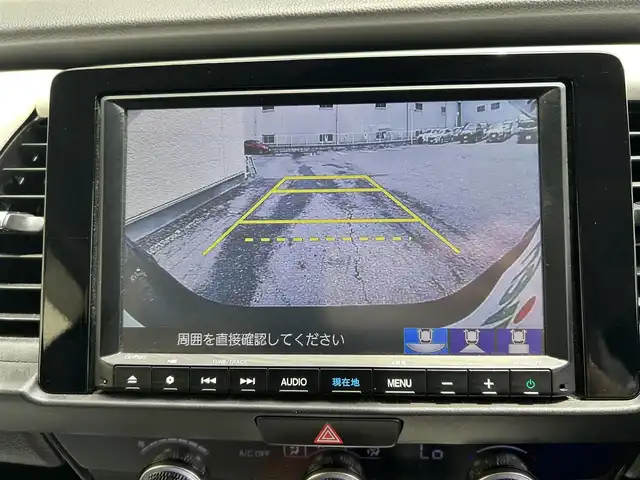 ホンダ フィット e:HEVホーム 大阪府 2020(令2)年 6.2万km ミッドナイトブルービームM 純正8インチSDナビ/（Bluetooth/フルセグTV/CD/DVD）/バックカメラ/前後コーナーセンサー/追従型クルーズコントロール/レーンキープアシスト/衝突被害軽減システム/盗難防止装置/純正ETC2.0/純正ドライブレコーダー（前後）/プッシュスタート/オートライト/オートマチックハイビーム/LEDライト/取扱説明書/スマートキー×2