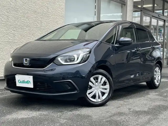 ホンダ フィット e:HEVホーム 大阪府 2020(令2)年 6.2万km ミッドナイトブルービームM 純正8インチSDナビ/（Bluetooth/フルセグTV/CD/DVD）/バックカメラ/前後コーナーセンサー/追従型クルーズコントロール/レーンキープアシスト/衝突被害軽減システム/盗難防止装置/純正ETC2.0/純正ドライブレコーダー（前後）/プッシュスタート/オートライト/オートマチックハイビーム/LEDライト/取扱説明書/スマートキー×2