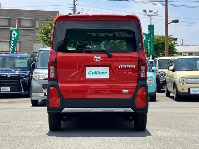 ダイハツ タント ファンクロス 静岡県 2022(令4)年 0.1万km コンパーノレッド エンジンスタートボタン/保証書/取扱説明書/パワーステアリング/パワーウィンドウ/アイドリングストップ/スマートキー/スペアキー１本/オートエアコン/USB入力端子/バックカメラ/純正メモリナビ（CD/DVD/フルセグ）/ベンチシート/D席N席シートヒーター/両側パワースライドドア/ルーフレール/純正アルミホイール/ABS/横滑り防止装置/コーナーセンサー前後/レーンキープアシスト/盗難防止装置/オートライト/オートマチックハイビーム/LEDヘッドライト/Wプラスサイドエアバック/カーテンエアバック/衝突軽減システム