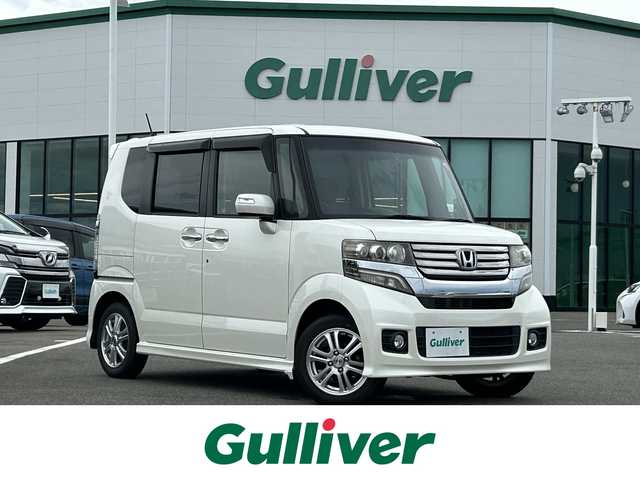 ホンダ Ｎ ＢＯＸ カスタム G Lパッケージ 佐賀県 2012(平24)年 6.9万km プレミアムホワイトパール 社外SDナビゲーション/・フルセグTV/CD/DVD/SD/Bluetooth/バックカメラ/前後ドライブレコーダー/ETC/横滑り防止装置/片側パワースライドドア/ISOFIX対応/ステアリングリモコン/純正14インチアルミホイール/純正キセノンヘッドライト/純正フォグランプ/純正フロアマット/純正ドアバイザ―/新車保証書/取扱説明書/スペアキー1本