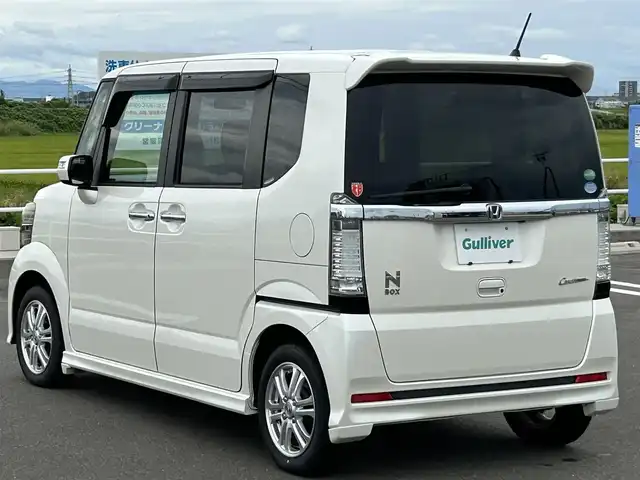 ホンダ Ｎ ＢＯＸ カスタム G Lパッケージ 佐賀県 2012(平24)年 6.9万km プレミアムホワイトパール 社外SDナビゲーション/・フルセグTV/CD/DVD/SD/Bluetooth/バックカメラ/前後ドライブレコーダー/ETC/横滑り防止装置/片側パワースライドドア/ISOFIX対応/ステアリングリモコン/純正14インチアルミホイール/純正キセノンヘッドライト/純正フォグランプ/純正フロアマット/純正ドアバイザ―/新車保証書/取扱説明書/スペアキー1本