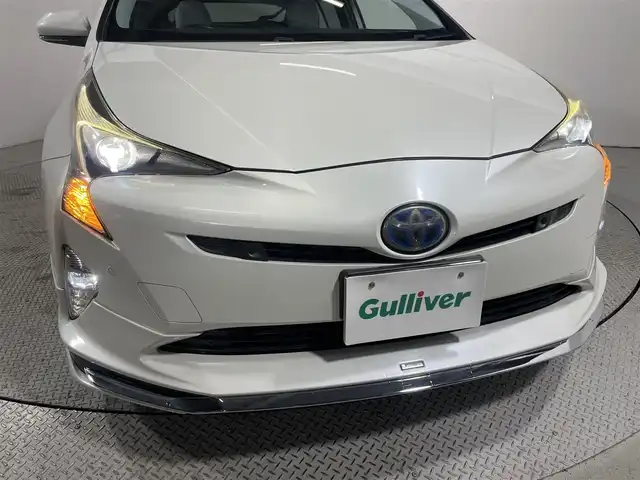 トヨタ プリウス A プレミアム　ツーリングセレ 大阪府 2016(平28)年 6万km ホワイトパールクリスタルシャイン モデリスタエアロ　白革シート　純正ナビ　バックカメラ　フルセグTV DVD再生　トヨタセーフティーセンス　レーダークルーズ　BSM HUD　パワーシート　シートヒーター　前後ドライブレコーダー　クリアランスソナー　オートライト　LEDヘッドライト　ETC