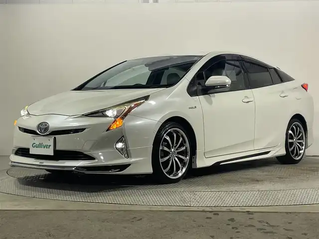 トヨタ プリウス A プレミアム　ツーリングセレ 大阪府 2016(平28)年 6万km ホワイトパールクリスタルシャイン モデリスタエアロ　白革シート　純正ナビ　バックカメラ　フルセグTV DVD再生　トヨタセーフティーセンス　レーダークルーズ　BSM HUD　パワーシート　シートヒーター　前後ドライブレコーダー　クリアランスソナー　オートライト　LEDヘッドライト　ETC