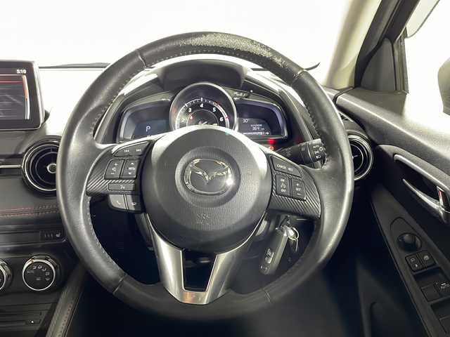 マツダ デミオ XD ツーリング 沖縄県 2016(平28)年 1.6万km チタニウムフラッシュマイカ 県外仕入れ　/禁煙車/純正ナビ/・ＣＤ／ＤＶＤ／フルセグＴＶ／Ｂｌｕｅｔｏｏｔｈ/バックカメラ/ヘッドアップディスプレイ/純正１６インチアルミ/シートヒーター/ＥＴＣ/クルーズコントロール/スペアキー/USB/保証書/取扱説明書