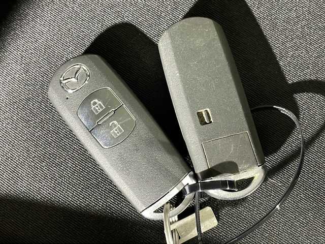 マツダ デミオ XD ツーリング 沖縄県 2016(平28)年 1.6万km チタニウムフラッシュマイカ 県外仕入れ　/禁煙車/純正ナビ/・ＣＤ／ＤＶＤ／フルセグＴＶ／Ｂｌｕｅｔｏｏｔｈ/バックカメラ/ヘッドアップディスプレイ/純正１６インチアルミ/シートヒーター/ＥＴＣ/クルーズコントロール/スペアキー/USB/保証書/取扱説明書