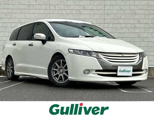 ホンダ オデッセイ アブソルート 新潟県 2011(平23)年 11.9万km プレミアムホワイトパール 横滑り防止/フリップダウンモニター/クルーズコントロール/全方位カメラ/パドルシフト/純正ナビ/（フルセグ、Bluetooth、CD/DVD、AM/FM）/純正ETC/ハーフレザーシート/スマートキー/エアロパーツ/純正フロアマット/キセノンヘッドライト