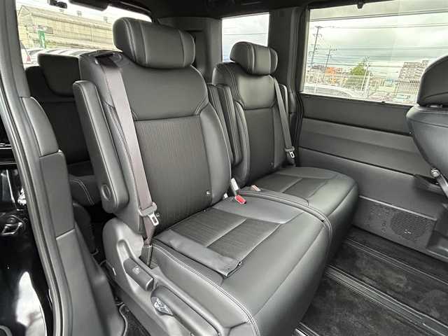 ホンダ ステップワゴン スパーダ eHEV 福岡県 2022(令4)年 1万km クリスタルブラックパール 純正11.4型SDナビ（フルセグTV/CD/DVD/BT）バックモニターホンダセンシングコーナーセンサーレーダークルコン両側パワスラ前後ドラレコシートヒーターオットマンUSBポート純正LEDヘッドライト純正16インチアルミホイル純正フロアマットプッシュスタートスマートキー