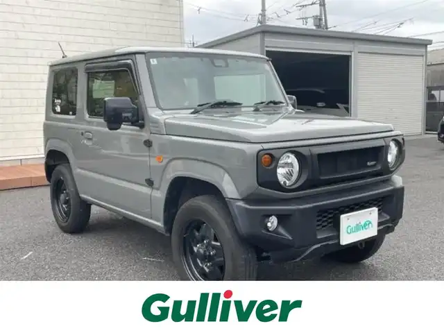 スズキ ジムニー XL 茨城県 2020(令2)年 5.8万km ミディアムグレー ナビ　/-BT/AM/FM/CD/TV/衝突軽減システム　/ターボ　/純正アルミホイール /レザーシートカバー /スマートキー /D席N席シートヒーター /前後ドライブレコーダー /電動格納ミラー /アイドリングストップ /５MT /ETC /プッシュスタート/スペアタイヤ/スペアキー