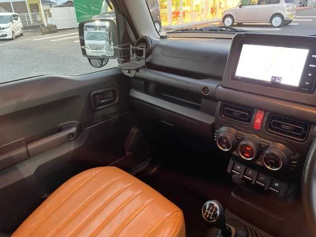 スズキ ジムニー XL 茨城県 2020(令2)年 5.8万km ミディアムグレー ナビ　/-BT/AM/FM/CD/TV/衝突軽減システム　/ターボ　/純正アルミホイール /レザーシートカバー /スマートキー /D席N席シートヒーター /前後ドライブレコーダー /電動格納ミラー /アイドリングストップ /５MT /ETC /プッシュスタート/スペアタイヤ/スペアキー