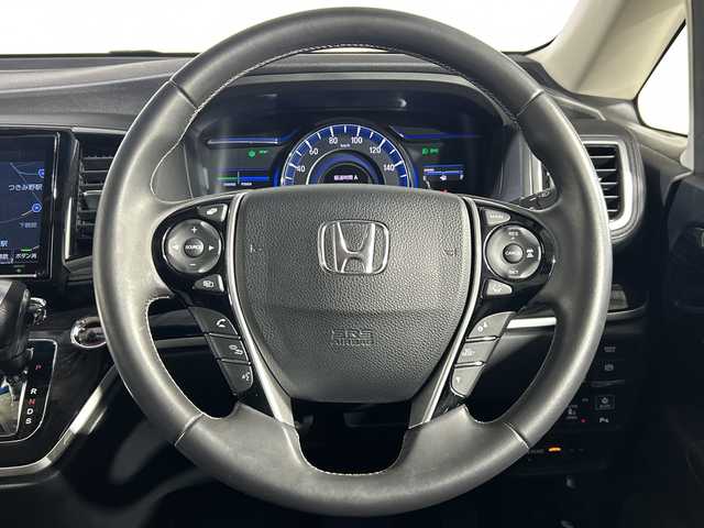 ホンダ オデッセイ ハイブリッド アブソルート・EXホンダセンジング 神奈川県 2018(平30)年 6.5万km プラチナホワイトパール 純正9型メモリーナビゲーション【VXM-187VFNi】/純正フリップダウンモニター/フルセグ　CD DVD　SDMUSICRACK　Bluetooth　iPod　USB/マルチビューカメラ/スマートパーキングアシスト/パーキングセンサーシステム/ブラインドスポットインフォメーション/ホンダセンシング/衝突軽減ブレーキ/歩行者事故低減ステアリング/アダブティブクルーズコントロール/LKAS車線維持支援システム/路外逸脱抑制機能/誤発進抑制機能/先行車発進お知らせ機能/標識認識機能/ECON/純正ビルトインETC2.0/2列目オットマン/ハーフレザーシート/前席シートヒーター/パワーシート/革巻きステアリング/自動防眩ルームミラー/社外前後ドライブレコーダー/電動パーキングブレーキ/オートブレーキホールド/プラズマクラスター付オートエアコン/プッシュスタート/スマートキー/LEDヘッド/フォグランプ/LEDアクティブコーナリングランプ/オートライト/純正17インチアルミホイール/純正サイド/リアスポイラー/スペアキー