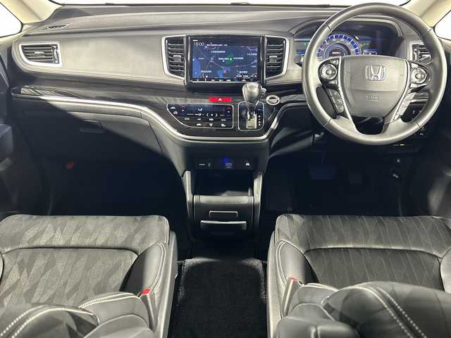 ホンダ オデッセイ ハイブリッド アブソルート・EXホンダセンジング 神奈川県 2018(平30)年 6.5万km プラチナホワイトパール 純正9型メモリーナビゲーション【VXM-187VFNi】/純正フリップダウンモニター/フルセグ　CD DVD　SDMUSICRACK　Bluetooth　iPod　USB/マルチビューカメラ/スマートパーキングアシスト/パーキングセンサーシステム/ブラインドスポットインフォメーション/ホンダセンシング/衝突軽減ブレーキ/歩行者事故低減ステアリング/アダブティブクルーズコントロール/LKAS車線維持支援システム/路外逸脱抑制機能/誤発進抑制機能/先行車発進お知らせ機能/標識認識機能/ECON/純正ビルトインETC2.0/2列目オットマン/ハーフレザーシート/前席シートヒーター/パワーシート/革巻きステアリング/自動防眩ルームミラー/社外前後ドライブレコーダー/電動パーキングブレーキ/オートブレーキホールド/プラズマクラスター付オートエアコン/プッシュスタート/スマートキー/LEDヘッド/フォグランプ/LEDアクティブコーナリングランプ/オートライト/純正17インチアルミホイール/純正サイド/リアスポイラー/スペアキー