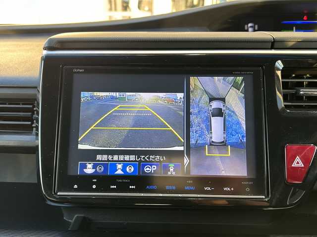 ホンダ ステップワゴン スパーダ ハイブリッド G EX ホンダセンシング 静岡県 2017(平29)年 9.7万km プレミアムスパークルブラックパール 純正メモリナビ/・CD/・DVD/・フルセグＴＶ/・Bluetooth/・USB/・AM/・FM/主要装備/・両側パワスラ/・後席モニター/・ホンダセンシング/・衝突軽減/・レーンキープ/・追従クルコン/・全方位カメラ/・ビルトインETC/・ドラレコ前後/・ハーフレザーシート/・シートヒーターD/N席/・電動パーキングブレーキ/・オートホールド/・純正フロアマット/・純正アルミホイール/・LEDヘッドライト/・オートライト/・ステリモ