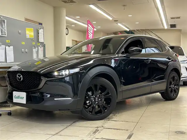 マツダ ＣＸ－３０ 20S レトロスポーツED 東京都 2024(令6)年 0.3万km ジェットブラックマイカ ワンオーナー/純正ナビ（AM/FM/BT/フルセグTV/HDMI/USB）/バック＋360度カメラ/ＢＯＳＥサウンド/F/Rコーナーセンサー/ハーフレザーシート（茶黒）/ACC/TCS/HUD/運転席パワーシート/メモリーシート/純正前後ドラレコ/電動リアゲート/スマートキー/プッシュスタート/スペアキー×１/ＥＴＣ2.0/ＬＥＤライト/オートライト/オートハイビーム/ステアリングスイッチ/革巻きステアリング/パドルシフト/アイドリングストップ/純正フロアマット/電格ウィンカーミラー/ＩＳＯＦＩＸ/純正18インチアルミホイール/Ｗエアバック/保証書/取扱説明書/ディーラー記録簿