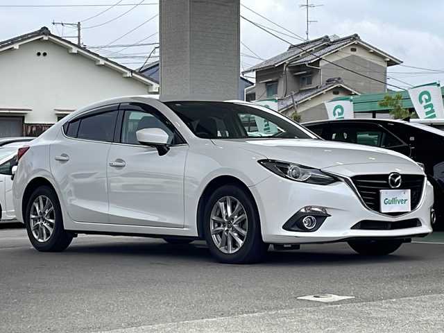 マツダ アクセラ ハイブリッド S 愛媛県 2015(平27)年 11.2万km スノーフレイクホワイトパールマイカ 純正ナビ/・フルセグTV/・Bluetooth接続/・CD/DVD再生/・AM/FM/バックカメラ/ビルトインETC/クルーズコントロール/リアビークルモニタリングシステム/アダプティブフロントライティングシステム/ヘッドアップディスプレイ/オートライト/スペアキー/純正16インチアルミ/純正フロアマット/フォグランプ