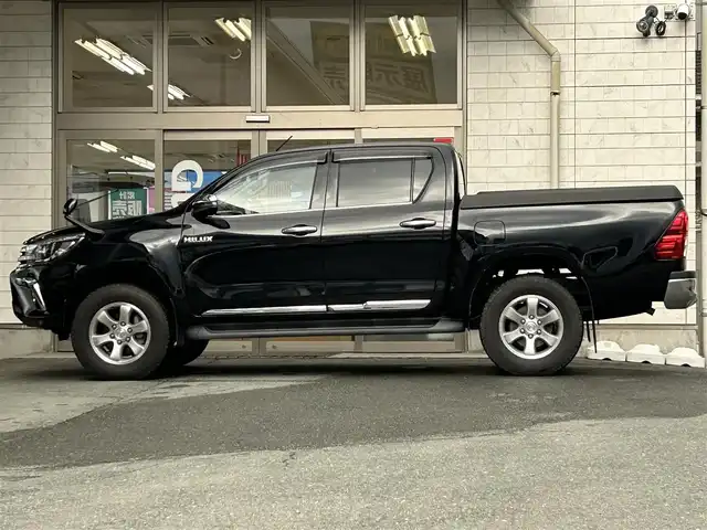 トヨタ ハイラックス Z 岩手県 2018(平30)年 1.9万km アティチュードブラックマイカ ・4WD/・純正ナビ（NSZT-W66T）/・フルセグ/・AM/FM/CD/Bluetooth/・プッシュスタート/・スマートキー/・スペアキー1本/・Toyota Safety Sense/・横滑り防止/・オートライト/・LEDヘットライト/・レーダークルーズコントロール/・ダウンヒルアシストコントロール/・MTモード付AT/・純正ETC/・純正フロアマット/・純正ドアバイザー/・純正AW/・ハードノトカバー/・純正ダンパー/・サマータイヤ純正AWセット積み/・保証書/・取扱説明書