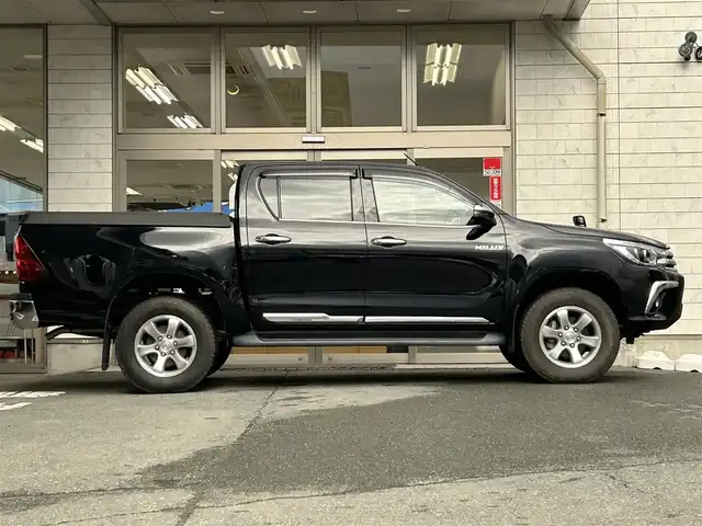 トヨタ ハイラックス Z 岩手県 2018(平30)年 1.9万km アティチュードブラックマイカ ・4WD/・純正ナビ（NSZT-W66T）/・フルセグ/・AM/FM/CD/Bluetooth/・プッシュスタート/・スマートキー/・スペアキー1本/・Toyota Safety Sense/・横滑り防止/・オートライト/・LEDヘットライト/・レーダークルーズコントロール/・ダウンヒルアシストコントロール/・MTモード付AT/・純正ETC/・純正フロアマット/・純正ドアバイザー/・純正AW/・ハードノトカバー/・純正ダンパー/・サマータイヤ純正AWセット積み/・保証書/・取扱説明書