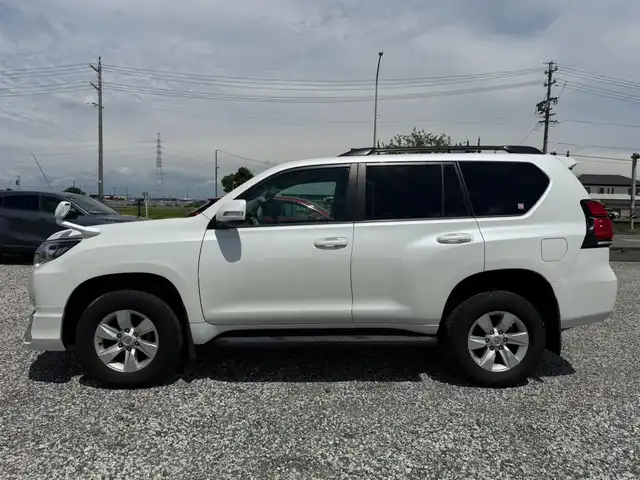 トヨタ ランドクルーザー プラド TX 富山県 2017(平29)年 7.5万km ホワイトパールクリスタルシャイン 〇モデリスタエアロ/〇ムーンルーフ/〇純正8インチナビ/〇フルセグTV/〇バックカメラ/〇パノラマモニター/〇ビルトインETC/〇7人乗り/〇セーフティセンスP/・レーダークルーズコントロール/・プリクラッシュセーフティーシステム/・レーンディパーチャーアラート/・オートマチックハイビーム/〇トラクションコントロール/〇ヒルスタートアシストコントロール/〇LEDヘッドランプ/〇オートライト/〇LEDフロントフォグランプ/〇純正17インチアルミ/〇左右独立温度調整機能付オートエアコン/〇スマートエントリー/スタートシステム/〇禁煙車
