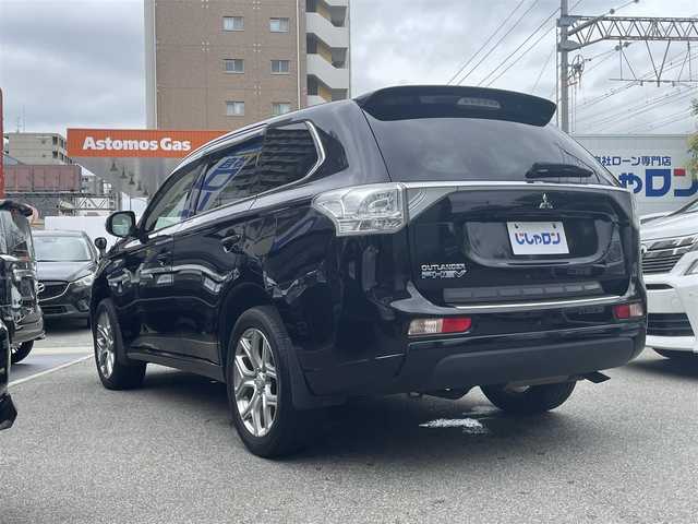 三菱 アウトランダー ＰＨＥＶ G セーフティパッケージ 兵庫県 2014(平26)年 11.9万km アメジストブラック (株)IDOMが運営する【じしゃロン西宮店】の自社ローン専用車両になります。こちらは現金またはオートローンご利用時の価格です。自社ローンご希望の方は別途その旨お申付け下さい/＊ETC/＊クルーズコントロールあり/＊フルセグ/＊シートヒーター/＊エアシート/＊横滑り防止装置/＊オートライト/＊レーンキープアシスト/＊衝突被害軽減システム