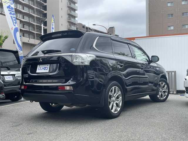 三菱 アウトランダー ＰＨＥＶ G セーフティパッケージ 兵庫県 2014(平26)年 11.9万km アメジストブラック (株)IDOMが運営する【じしゃロン西宮店】の自社ローン専用車両になります。こちらは現金またはオートローンご利用時の価格です。自社ローンご希望の方は別途その旨お申付け下さい/＊ETC/＊クルーズコントロールあり/＊フルセグ/＊シートヒーター/＊エアシート/＊横滑り防止装置/＊オートライト/＊レーンキープアシスト/＊衝突被害軽減システム