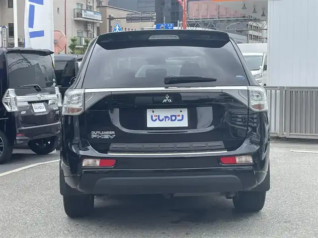 三菱 アウトランダー ＰＨＥＶ G セーフティパッケージ 兵庫県 2014(平26)年 11.9万km アメジストブラック (株)IDOMが運営する【じしゃロン西宮店】の自社ローン専用車両になります。こちらは現金またはオートローンご利用時の価格です。自社ローンご希望の方は別途その旨お申付け下さい/＊ETC/＊クルーズコントロールあり/＊フルセグ/＊シートヒーター/＊エアシート/＊横滑り防止装置/＊オートライト/＊レーンキープアシスト/＊衝突被害軽減システム