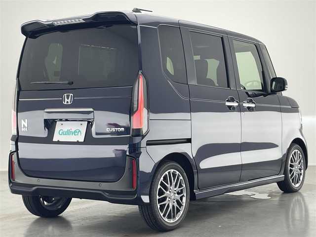 ホンダ Ｎ ＢＯＸ カスタム ターボ 愛知県 2025(令7)年 0.5万km ミッドナイトブルービームM 純８型ナビ　フルセグＴＶ　Ｂｌｕｅｔｏｏｔｈ　バックカメラ　両側電動スライドドア　レーダークルコン　ＥＴＣ　ＬＥＤヘッドライト　ホンダコネクトナビ装着ＰＫＧ　プッシュスタート　スマートキー　禁煙車
