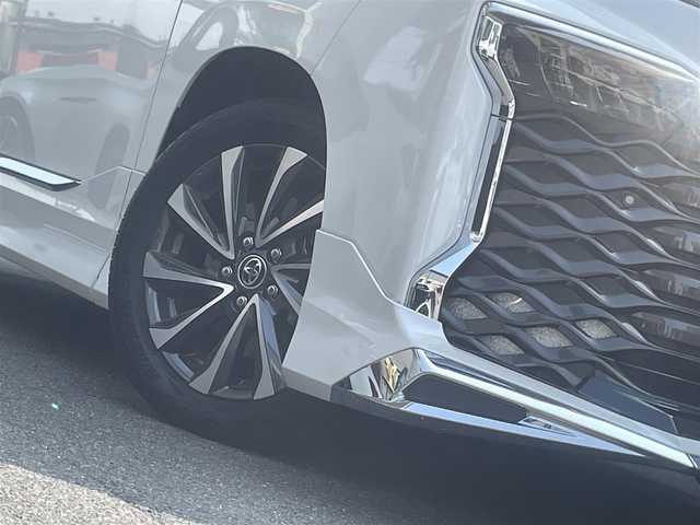 トヨタ ヴォクシー ハイブリッド S－Z 愛知県 2023(令5)年 1万km ホワイトパールクリスタルシャイン モデリスタエアロ/・フロント／サイド／リアアンダー/快適利便パッケージHifh/・ハンズフリー両側パワースライドドア/・ハンズフリーパワーバックドア/・2列目シートヒーター/・2列目オットマン/・ステアリングヒーター/・ナノイーX/ドライビングサポートパッケージ/・デジタルインナーミラー/・ヘッドアップディスプレイ/純正10.5型ディスプレイオーディオプラス/・車載メモリーナビ／DVD／Bluetooth／地デジTV/・Apple Car Play／Android Auto/・USB／HDMI/・ビルトインETC2.0/純正14型有機ELフリップダウンモニター/LEDヘッドライト＆クリアランスランプ/合皮＆ファブリックコンビシート/前席2列目シートヒーター/2列目充電用USBタイプC端子/ラゲッジルームアクセサリーコンセント/純正17インチAW/スマートキー