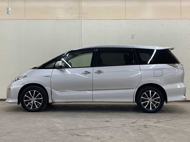 トヨタ エスティマ ハイブリッド アエラス プレミアムエディション 道央・札幌 2015(平27)年 7.1万km シルバーM /4WD//純正フルセグナビ/（AM/FM/BT/SD）//純正17インチAW//EVモード//SNOWモード//寒冷地仕様//ワイパーデアイサー//クルーズコントロール//ハーフレザーシート//D席パワーシート//パワーバックドア//AC100V//セカンドシートオットマン//横滑り防止装置//冬タイヤ社外AW積込有り
