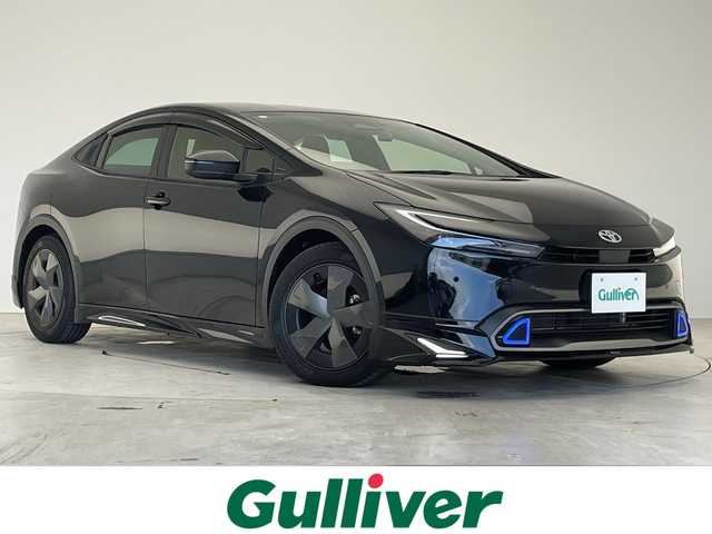 トヨタ プリウス U 愛知県 2023(令5)年 1.5万km アティチュードブラックマイカ トヨタセーフティセンス/モデリスタエアロ/純正ディズプレイオーディオ　ナビ機能なし/レーダークルーズコントロール/シートヒーター/バックカメラ/コーナーセンサー/純正アルミホイール/ETC2.0/ブラインドスポットモニター/LEDヘッドライト/ステアリングヒーター/オートマチックハイビーム/ドライブレコーダー/ステアリングスイッチ/スマートキー/プッシュスタート