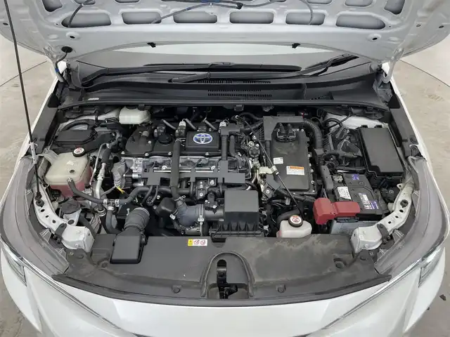 トヨタ カローラツーリング ハイブリッド ダブルバイビー 滋賀県 2020(令2)年 9.3万km ホワイトパールクリスタルシャイン 純正８インチナビ/（Bluetooth/USB/Miracast/フルセグTV）/バックカメラ/コーナーセンサー/追従型クルーズコントロール/電動パーキングブレーキ/衝突軽減装置/LEDライト/オートハイビーム/ハーフレザーシート/ビルトインＥＴＣ/プッシュスタート/スマートキー/オートホールド/ステアリングリモコン/オートライト