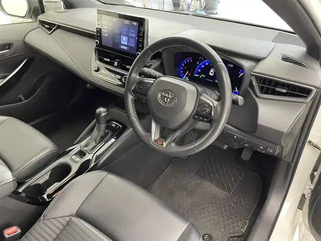トヨタ カローラツーリング ハイブリッド ダブルバイビー 滋賀県 2020(令2)年 9.3万km ホワイトパールクリスタルシャイン 純正８インチナビ/（Bluetooth/USB/Miracast/フルセグTV）/バックカメラ/コーナーセンサー/追従型クルーズコントロール/電動パーキングブレーキ/衝突軽減装置/LEDライト/オートハイビーム/ハーフレザーシート/ビルトインＥＴＣ/プッシュスタート/スマートキー/オートホールド/ステアリングリモコン/オートライト