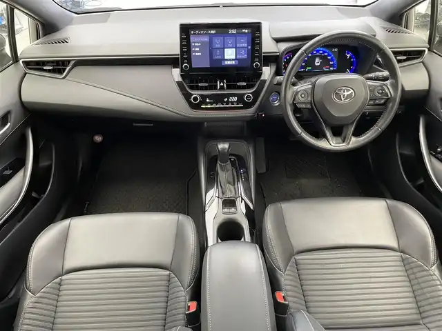 トヨタ カローラツーリング ハイブリッド ダブルバイビー 滋賀県 2020(令2)年 9.3万km ホワイトパールクリスタルシャイン 純正８インチナビ/（Bluetooth/USB/Miracast/フルセグTV）/バックカメラ/コーナーセンサー/追従型クルーズコントロール/電動パーキングブレーキ/衝突軽減装置/LEDライト/オートハイビーム/ハーフレザーシート/ビルトインＥＴＣ/プッシュスタート/スマートキー/オートホールド/ステアリングリモコン/オートライト