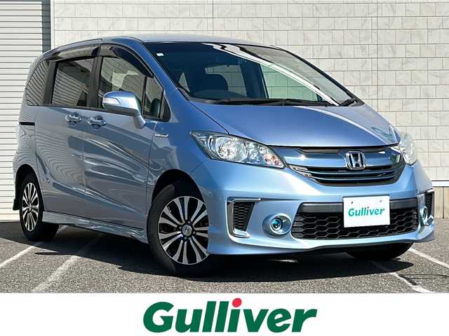 ホンダ フリード ハイブリット ジャストセレクション 新潟県 2014(平26)年 7.2万km プレミアムブルーオパールメタリック 社外ナビ【フルセグTV/FM・AM/BT】/バックカメラ/クルーズコントロール/両側パワースライドドア/ETC/ドライブレコーダー/ハーフレザーシート/3列シート/革巻きステアリング/ステアリングスイッチ/LEDヘッドライト/スマートキー/スペアキー/純正アルミホイール/純正フロアマット