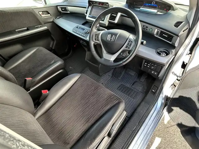 ホンダ フリード ハイブリット ジャストセレクション 新潟県 2014(平26)年 7.2万km プレミアムブルーオパールメタリック 社外ナビ【フルセグTV/FM・AM/BT】/バックカメラ/クルーズコントロール/両側パワースライドドア/ETC/ドライブレコーダー/ハーフレザーシート/3列シート/革巻きステアリング/ステアリングスイッチ/LEDヘッドライト/スマートキー/スペアキー/純正アルミホイール/純正フロアマット